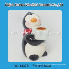 Useful ceramic candle holder in penguin shape